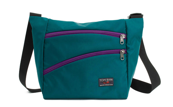 Icon in Seapine (bluish green) 630 Recycled with Ultraviolet (purple) zippers.